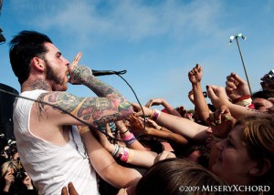 This dude's sideburns probably kick more ass and get him more chicks than his band name ever could.